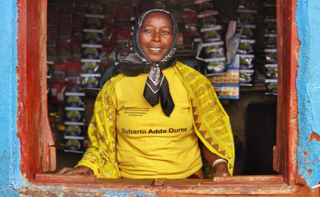 Dama Godona in her shop