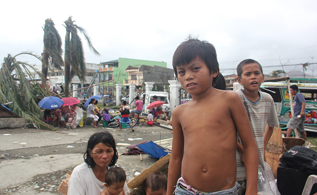 Rafael is 10, and lost his father to Typhoon Haiyan after staying with him to protect the family home