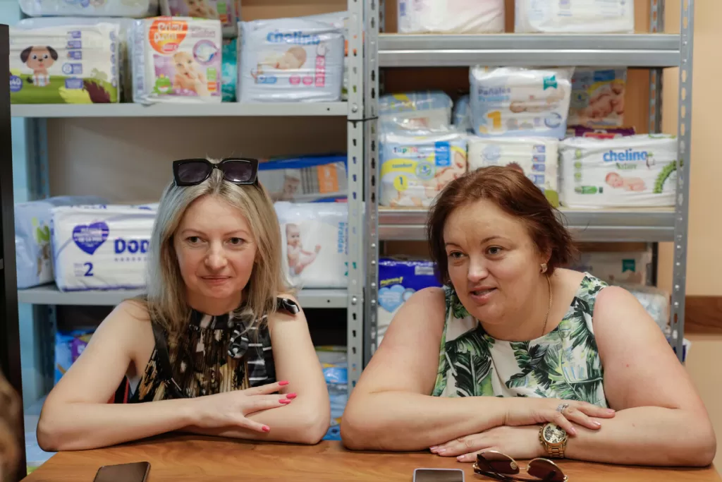 Inna & Svitlana sitting speaking to the DEC